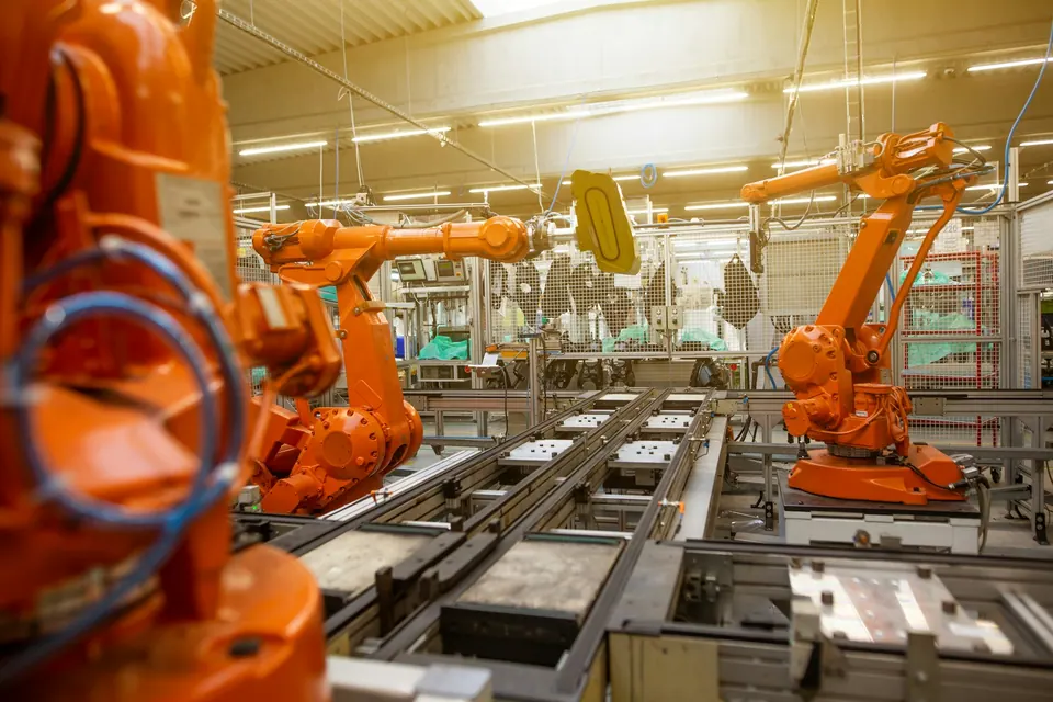 Industrial robots on an automotive production line